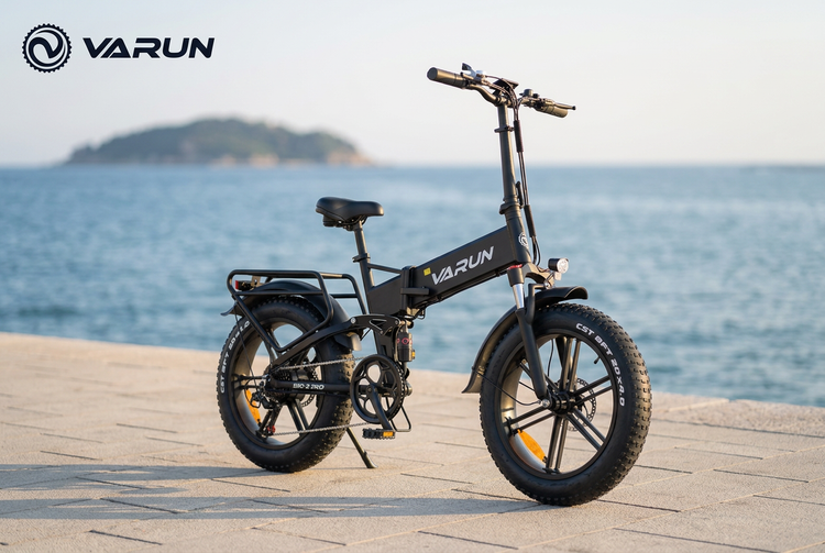 VARUN S20-2 Pro folding fat-tyre e-bike on a seaside boardwalk